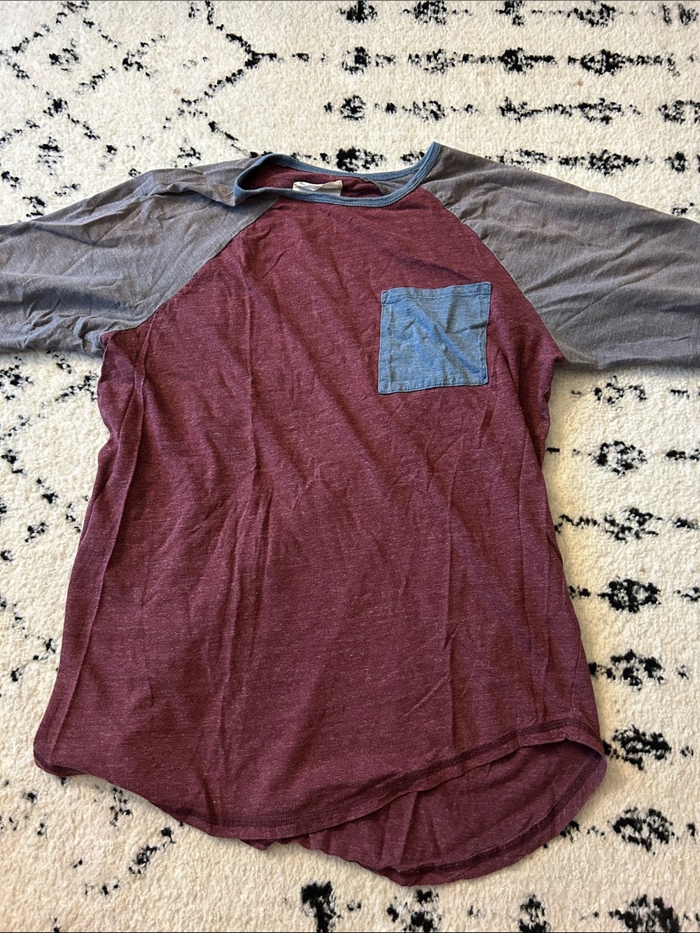 on the byas Kids Raglan Tee in Burgundy with Gray Sleeves and Blue Pocket
